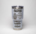 May include: A light blue travel mug with a silver rim and lid. The mug features the words "MILLENNIUM FALCON" in black, along with detailed illustrations of the spacecraft.