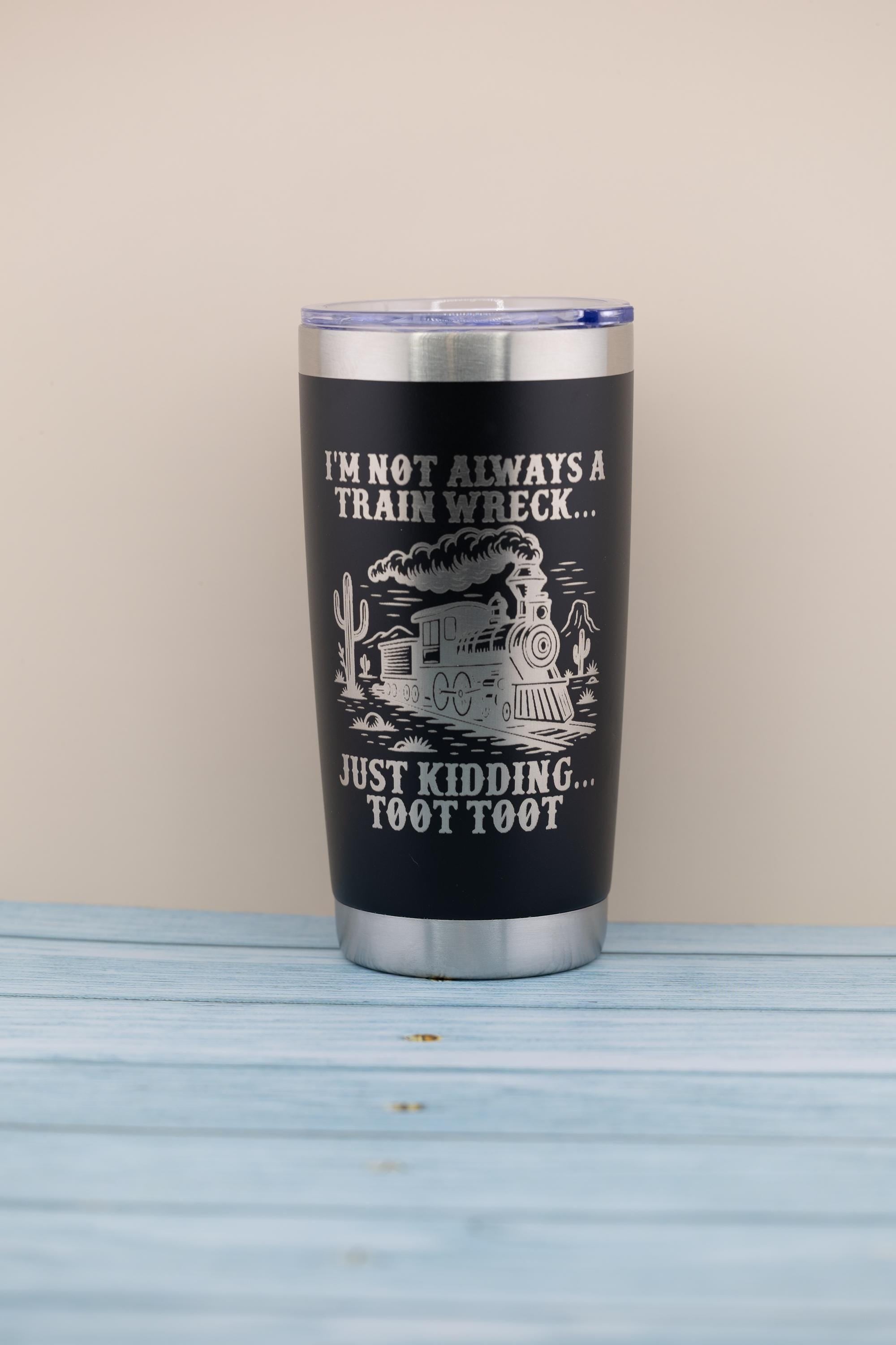 A black tumbler with a silver lid, featuring a humorous text and graphic design on its surface.