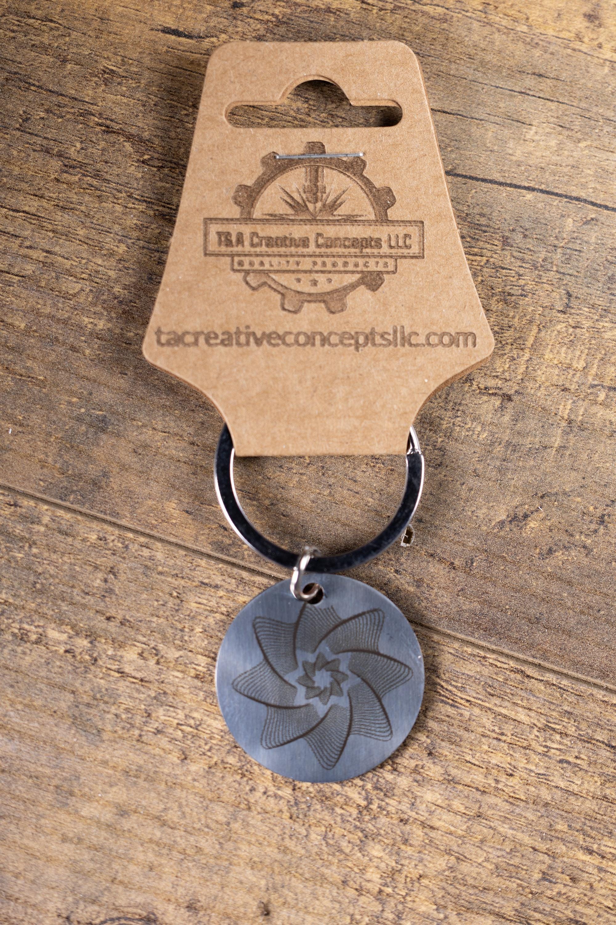 Polished Stainless Steel Keychain - Geometric Star Design with Laser Engraved Spiral Line