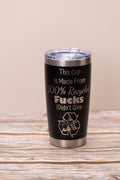 May include: Black insulated tumbler with a silver rim and lid. The tumbler features the text "This Cup Is Made From 100% Recycled Fucks I Didn't Give" and a recycling symbol with a person giving the middle finger.