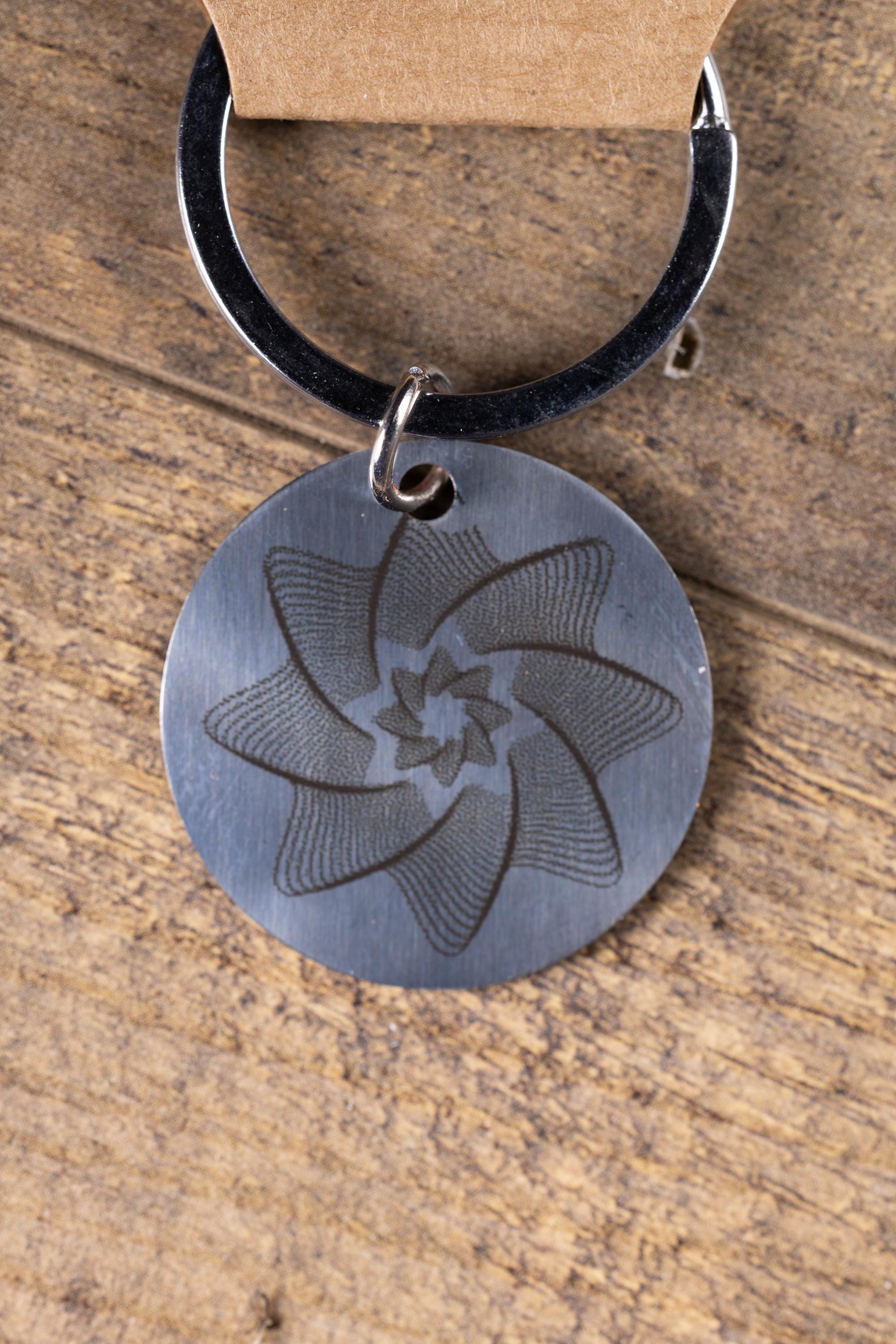 Polished Stainless Steel Keychain - Geometric Star Design with Laser Engraved Spiral Line